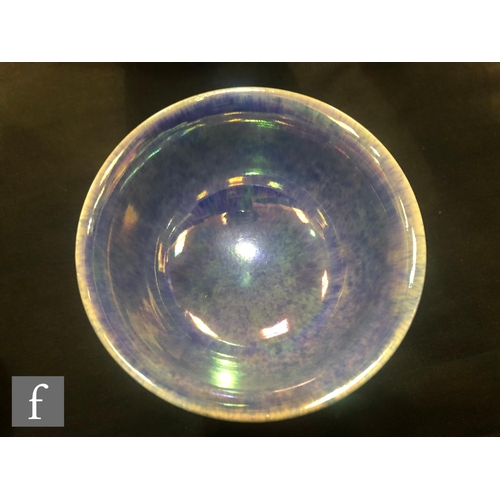 117 - Ruskin Pottery - A small footed bowl decorated in an all over lavender lustre, impressed mark and da... 