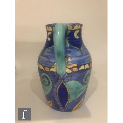 391 - Clarice Cliff - Inspiration Persian - A twin handled Lotus jug circa 1930, hand painted with a Persi... 