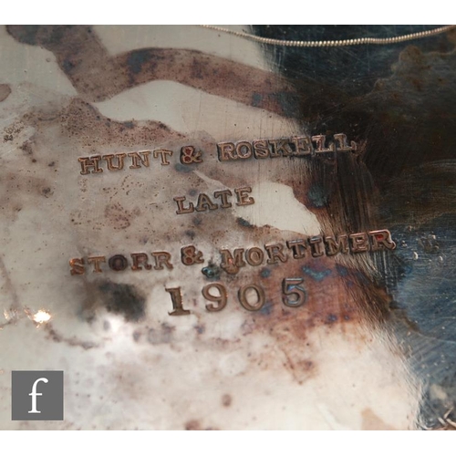 100 - A hallmarked silver twin handled punch bowl with fluted foot and body flanked by lion masked ring ha... 