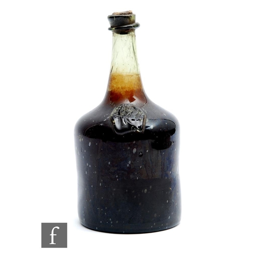 764 - A bottle of Hungarian Tokaji wine, circa 1650-1690, with seal showing crossed swords and indistinct ... 