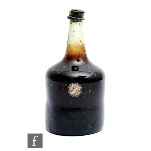 764 - A bottle of Hungarian Tokaji wine, circa 1650-1690, with seal showing crossed swords and indistinct ... 