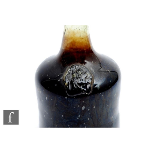 764 - A bottle of Hungarian Tokaji wine, circa 1650-1690, with seal showing crossed swords and indistinct ... 