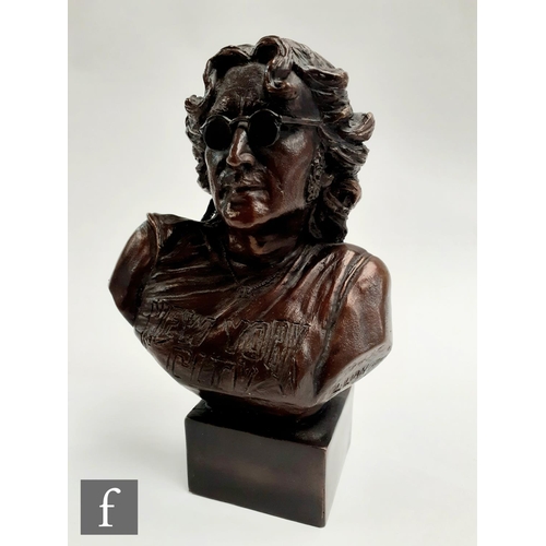 164 - A limited edition bronze bust of John Lennon, by Laura Lian, numbered 6/200 and signed, height 19cm.