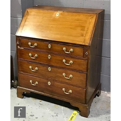 1151 - A George IV mahogany bureau with fall front and fitted interior above four graduated drawers and oge... 