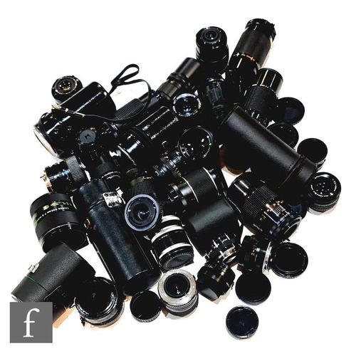 210 - A large collection of camera lenses, various formats and ranges, makers include Chinon, Praktica, Ki... 