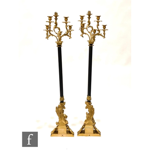 1159 - A pair of 19th Century French ormulu floorstanding candelabra by Ernest Albert Carrier-Belleuse (182... 