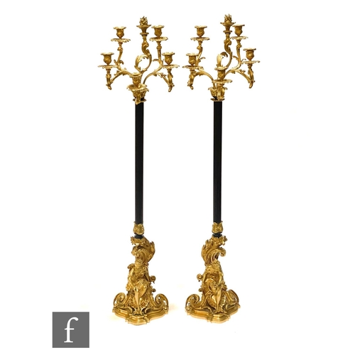 1159 - A pair of 19th Century French ormulu floorstanding candelabra by Ernest Albert Carrier-Belleuse (182... 