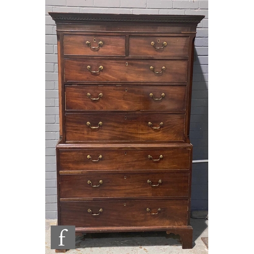 1162 - A George III mahogany chest on chest, fitted with an arrangement of two short and six long oak-lined... 