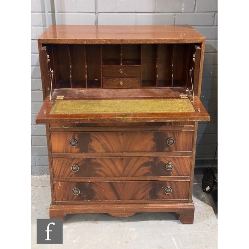 1164 - A late 20th Century mahogany secretaire writing chest in the Georgian style, the upper secretaire dr... 