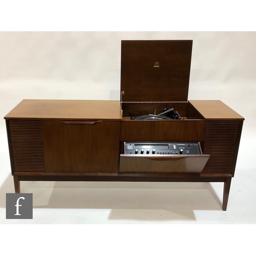 158 - An early 1970s Dynatron model RG81 radiogramophone in teak cabinet, containing a Garrard model 2025 ... 