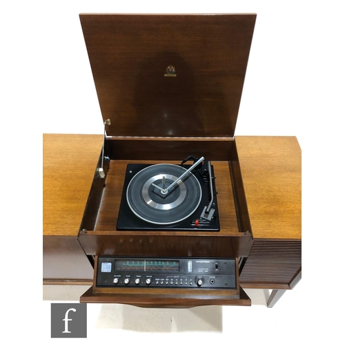 158 - An early 1970s Dynatron model RG81 radiogramophone in teak cabinet, containing a Garrard model 2025 ... 