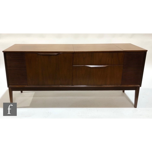 158 - An early 1970s Dynatron model RG81 radiogramophone in teak cabinet, containing a Garrard model 2025 ... 