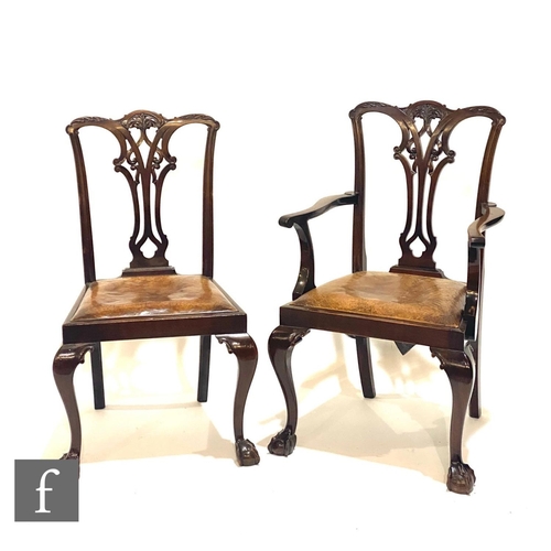 1140 - A set of six Chippendale style carved mahogany dining chairs, pierced vase splats below undulating t... 