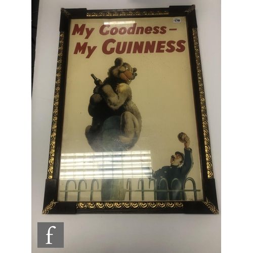 170 - A Guinness advertising poster, after John Gilroy, illustrated with a bear and a keeper, inscribed 'M... 