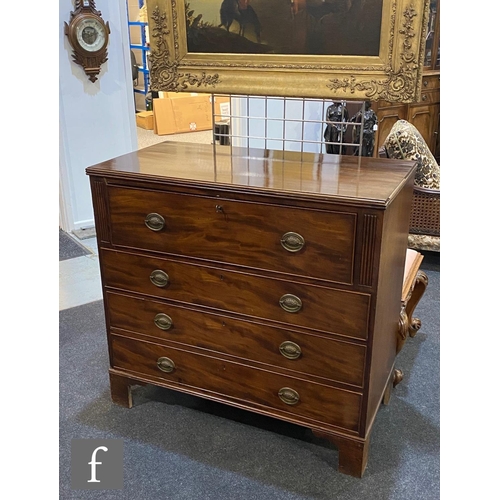 1152 - A George III style mahogany secretaire chest of four long cockbeaded drawers, the top drawer with fi... 