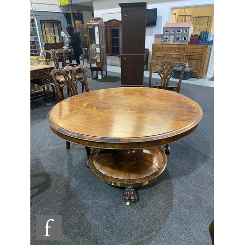 1156 - A 19th Century rosewood veneered tilt-top circular dining or breakfast table, the moulded edge top o... 