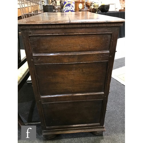 1139 - An 17th Century style oak geometric moulded oak chest of two short and three long drawers, applied m... 