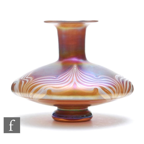 1049 - Igor Muller - A later 20th Century studio glass vase, of footed squat form with collar neck and ever... 