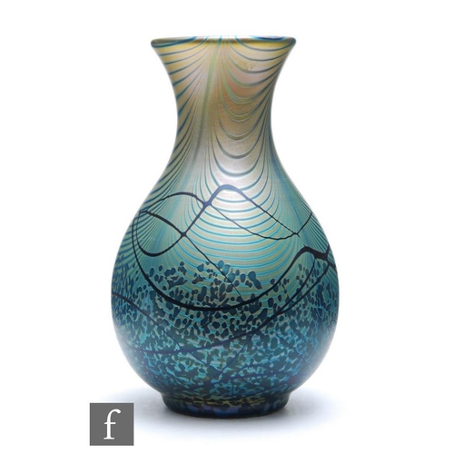 1050 - Okra - A contemporary studio glass vase of ovoid form with flared collar neck, decorated with golden... 