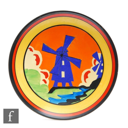 103 - Clarice Cliff - Applique Windmill - A circular dish form plate circa 1932, hand painted with a styli... 