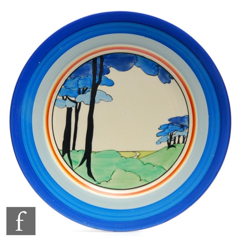 158 - Clarice Cliff - Blue Firs - A large circular plate circa 1933, hand painted to the central well with... 