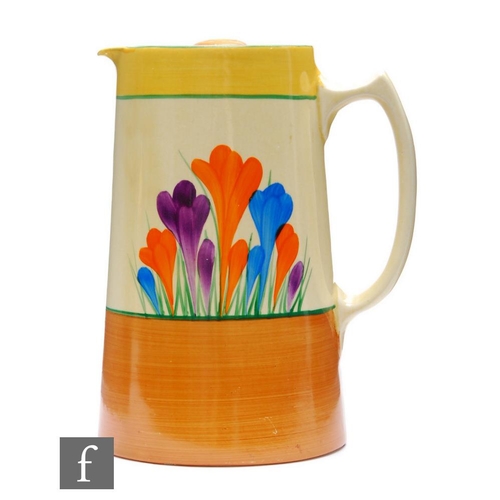 247 - Clarice Cliff - Crocus - A large Tankard shape hot water pot circa 1930, hand painted with Crocus sp... 