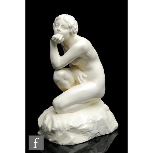 26 - Zsigmond Kisfaludi Strobl (Hungarian) - A 1930s white glazed sculpture of a female nude kneeling on ... 