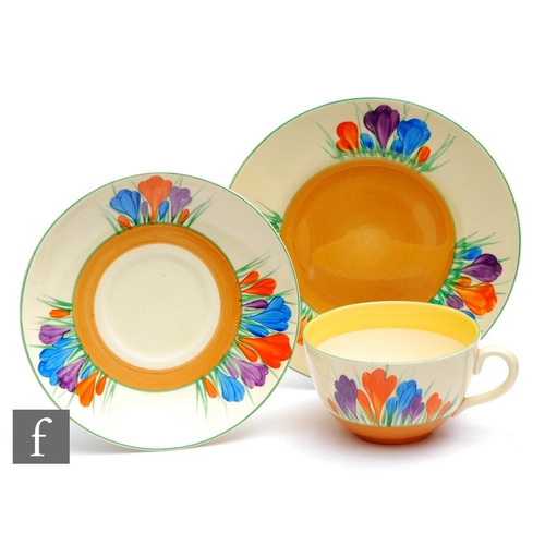 278 - Clarice Cliff - Crocus - A composed Globe shape cup, saucer and side plate hand painted with Crocus ... 