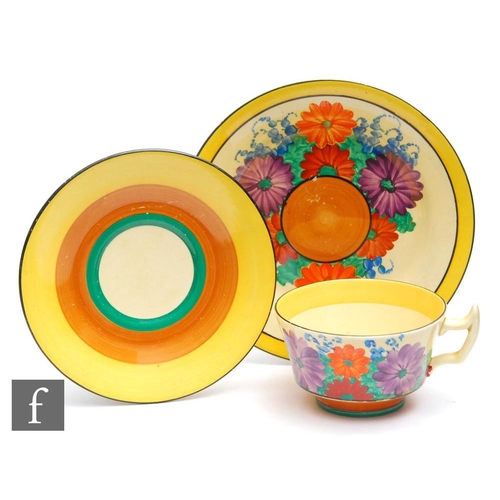 281 - Clarice Cliff - Gay Day - A composed Athens shape teacup saucer and side plate, hand painted with st... 