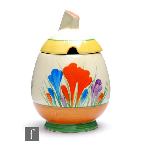 283 - Clarice Cliff - Crocus - A Daffodil shape preserve pot and cover circa 1933, hand painted with Crocu... 