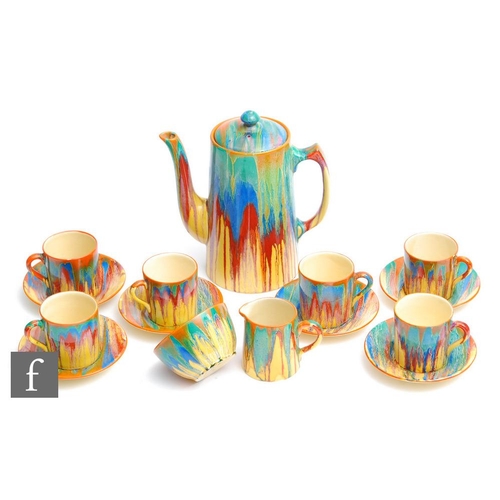 310 - Clarice Cliff - Delecia - A Tankard shape coffee service circa 1930, comprising six cans and saucers... 