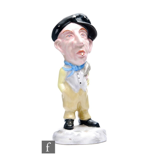 315 - Clarice Cliff - Miner - An early A.J.Wilkinsons figure of a miner with flat cap, waistcoat and yello... 