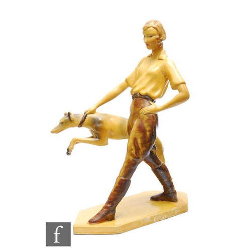 411 - Wade - A 1930s figure 'Christina', modelled as a striding female figure and greyhound, raised on a c... 