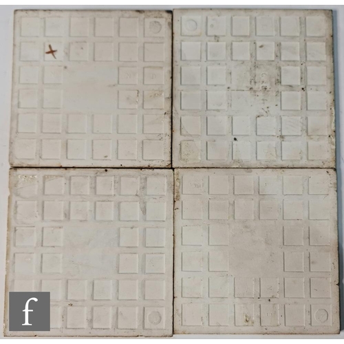 726 - Unknown - Four 6 inch tiles decorated in a brown on buff foliate pattern. (4)