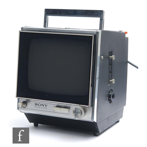 1231 - Sony - A Solid State Television, model 9-9OUB, serial number 14500, with plastic screen cover.