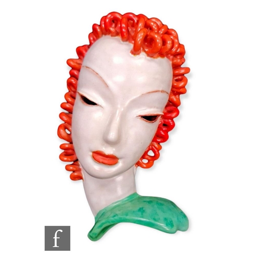 388 - Goldscheider - A wall mask modelled as a lady with curled orange hair and green shoulders, printed m... 