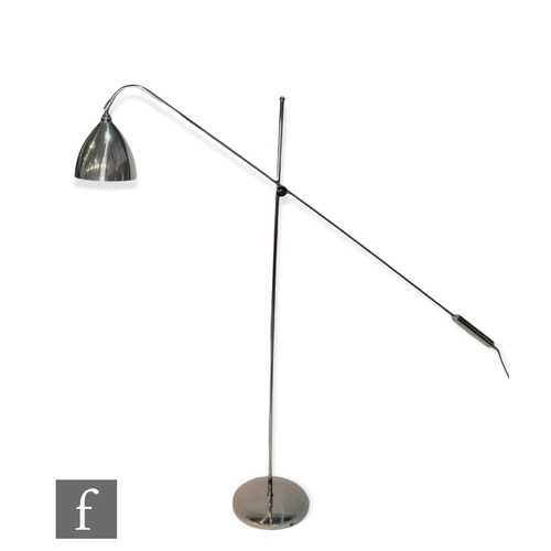 1218 - Original BTC - A task Overreach floorlight, in polished aluminium, with moveable shade and adjustabl... 