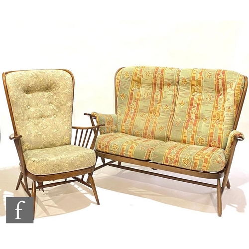 1163 - Lucian Ercolani - Ercol Furniture - A beech framed model 203 Windsor bergere two-seat settee or sofa... 