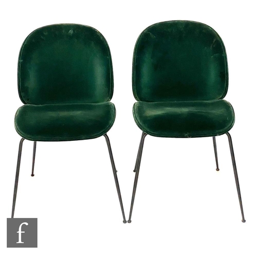 1173 - Unknown - A set of four 1960s style dining chairs, the plush dark green seat raised on tapered splay... 