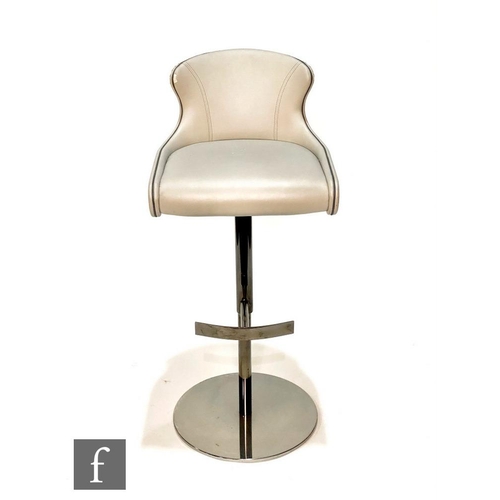 1175 - Roche Bobois - A Steeple bar stool, in grey leather with chrome stand, height 108cm, together with t... 