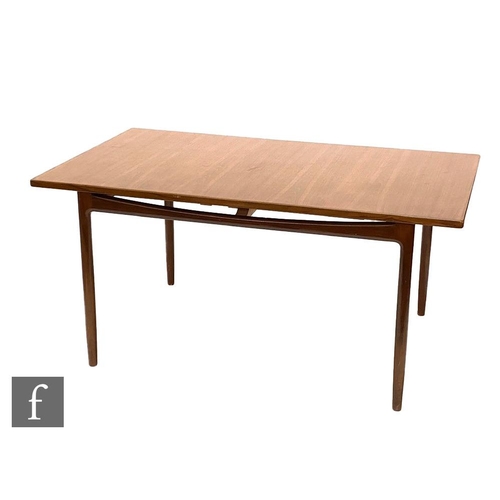 919 - Ib Kofod-Larsen - G-Plan - A model number 4399 teak extending dining table of rectangular form, with... 