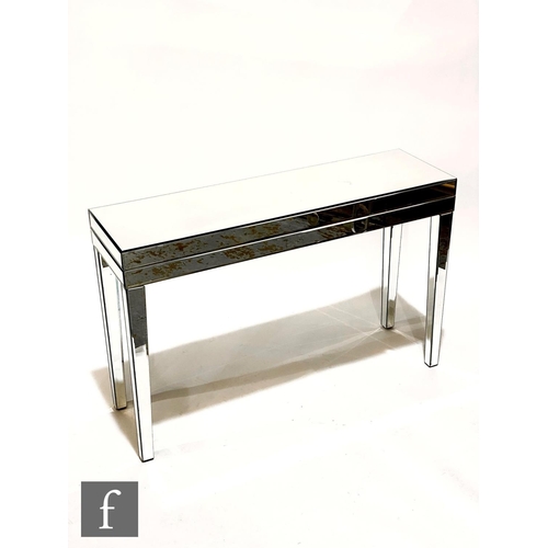 1236 - Unknown - A French style mirrored console table of rectangular form, applied with panelled mirrored ... 