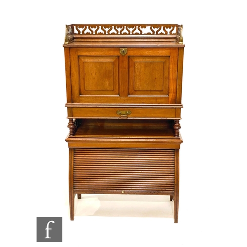 51 - James Shoolbred - A students walnut combination writing desk and bookcase, with fret-cut gallery ove... 