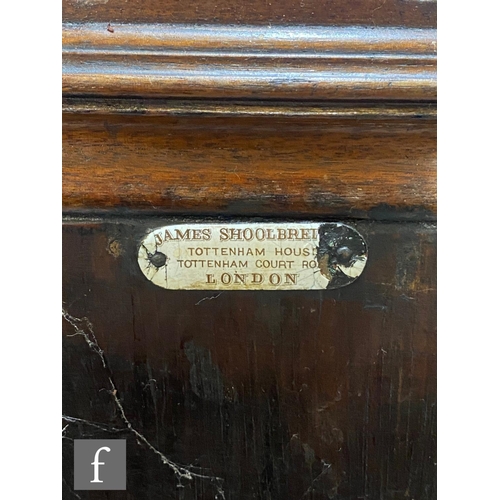 51 - James Shoolbred - A students walnut combination writing desk and bookcase, with fret-cut gallery ove... 