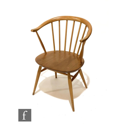 848 - Lucian Ercolani - Ercol Furniture - A beech and elm model 449a Windsor bow top armchair or 'Cowhorn'... 