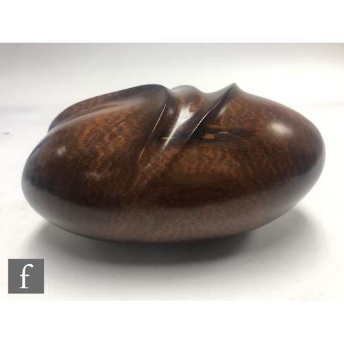 1072 - Jean Christophe Couradin - A hand carved and polished sculptural wooden form in snake wood, of ovoid... 