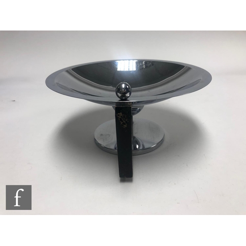 486 - Unknown - An Art Deco chrome plated circular bowl of plain form with black painted wooden side handl... 