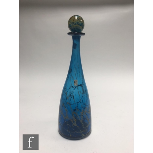 1055 - Mdina - A later 20th Century glass decanter, circa 1980, of tapering form, the blue body with ochre ... 