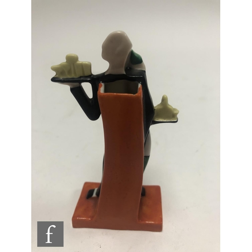 601 - Goebel - A 1930s Art Deco cocktail stick holder modelled as a butler and a maid dressed in green ser... 