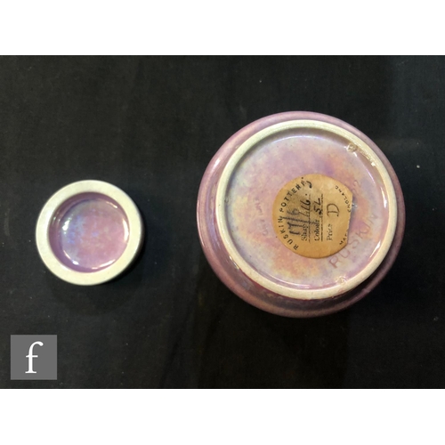 57 - Ruskin Pottery - A small caddy decorated in an all over Strawberry Crush lustre, impressed mark alon... 